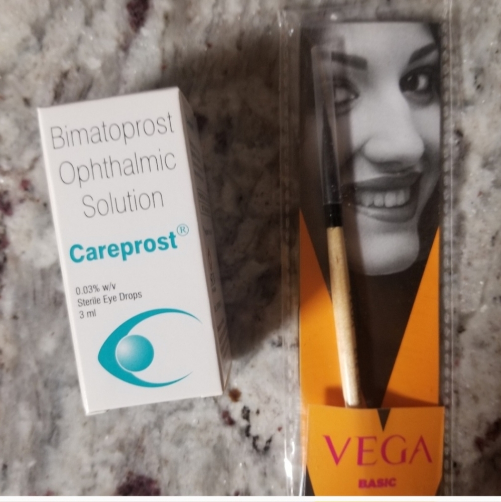 Eyelash growth serum with brush